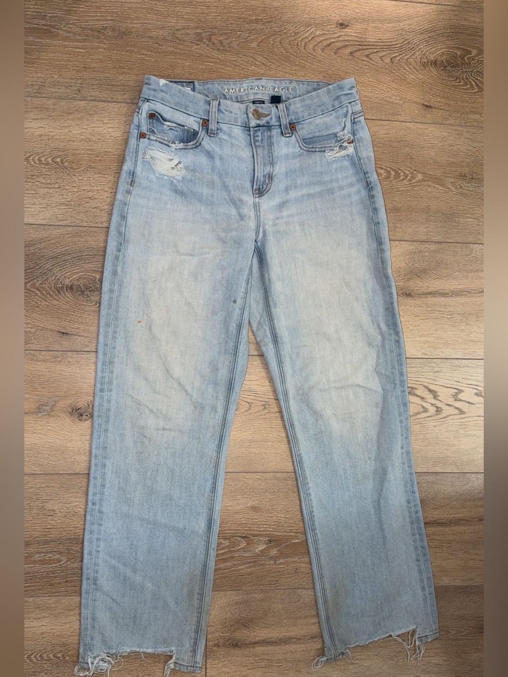 American Eagle Size 4 Light Wash Distressed Straight Leg Jeans Raw Hem